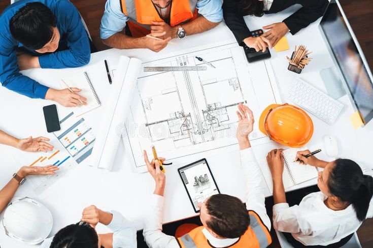 diverse group of civil engineer and client working on architect prudent stock photograp